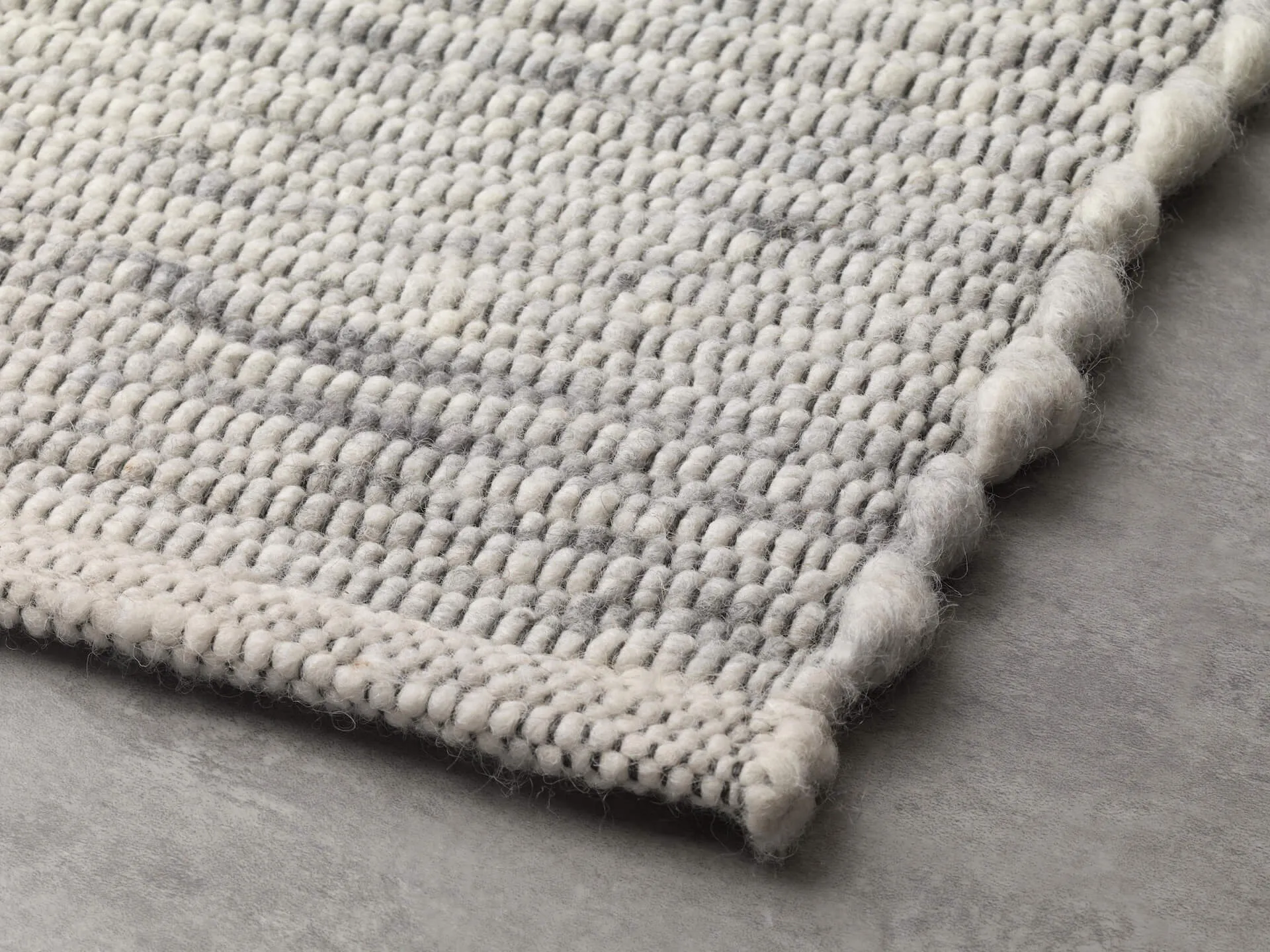 Handwebteppich Beat Tamoure, Paulig since 1750, Farbe 430, Detailansicht